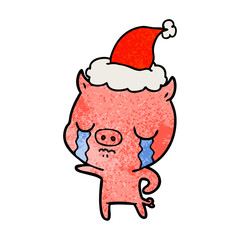 textured cartoon of a pig crying wearing santa hat