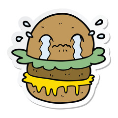 sticker of a cartoon crying fast food burger