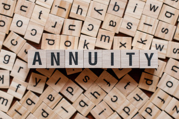 the word of ANNUITY on building blocks concept - obrazy, fototapety, plakaty