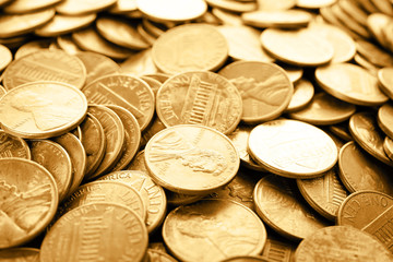 Many shiny USA one cent coins as background