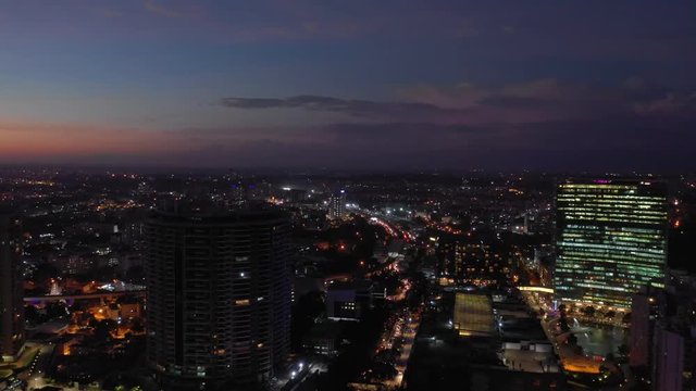 sunset night illuminated flight over bangalore cityscape aerial panorama 4k india