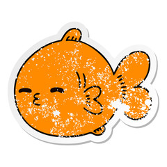 distressed sticker of a quirky hand drawn cartoon fish