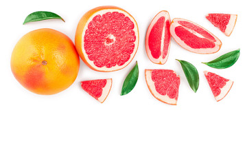 Grapefruit and slices with leaves isolated on white background with copy space for your text. Top view. Flat lay pattern