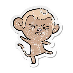Obraz na płótnie Canvas distressed sticker of a cartoon annoyed monkey