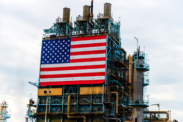 Large American Flag affixed to oil refinery
