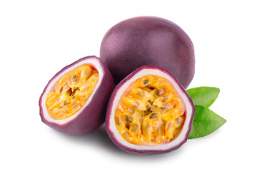 whole passion fruits and a half with leaves isolated on white background. Isolated maracuya
