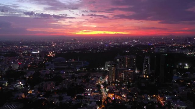 sunset sky flight over bangalore cityscape aerial panorama 4k india