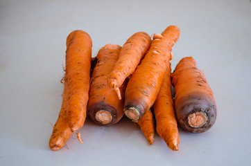 Fresh Carrots On White Surface