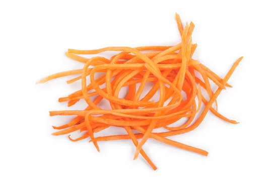 fresh shredded carrots isolated on white background, Top view. Flat lay