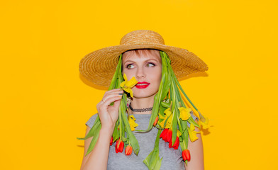 woman in hat with tulips instead of hair