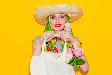 Woman in hat with tulips in hair holding shopping bag