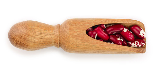 variegated kidney bean in wooden scoop isolated on white background. Top view. Flat lay