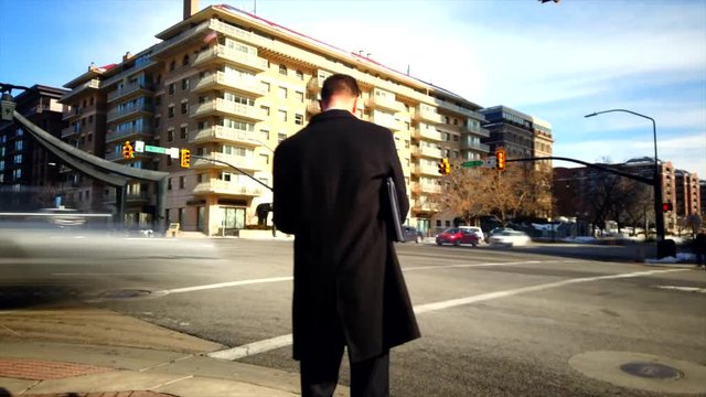 A mid-day timelapse of Downtown Salt lake city near Eagle gate on state street.