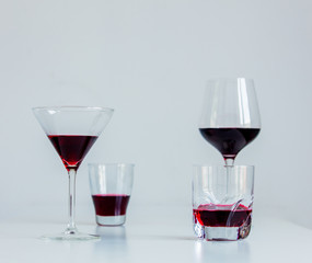 Red wine in a differnt glasses on a table