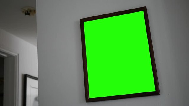 Green screen picture frame in modern hallway