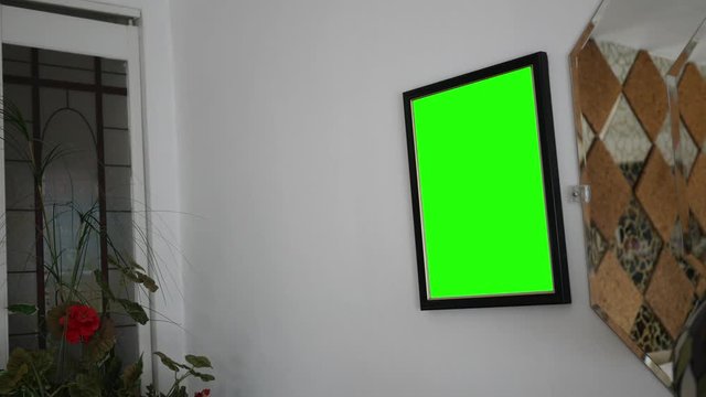 Green screen picture frame in modern living room wall