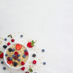 Naklejka na ściany i meble Oatmeal porridge with berries