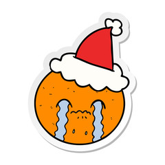 sticker cartoon of a orange wearing santa hat