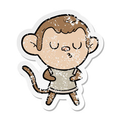 distressed sticker of a cartoon calm monkey