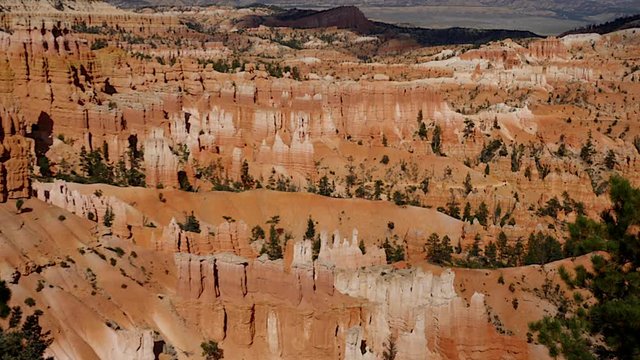 Clouds cast shadows in time-lapse shot over-looking Bryce Canyon, Utah.