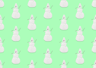 light green minimalistic seamless pattern with a funny snowman in pastel colors, modern art collage