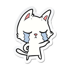 sticker of a crying cartoon cat
