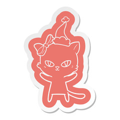 cute cartoon  sticker of a cat wearing santa hat