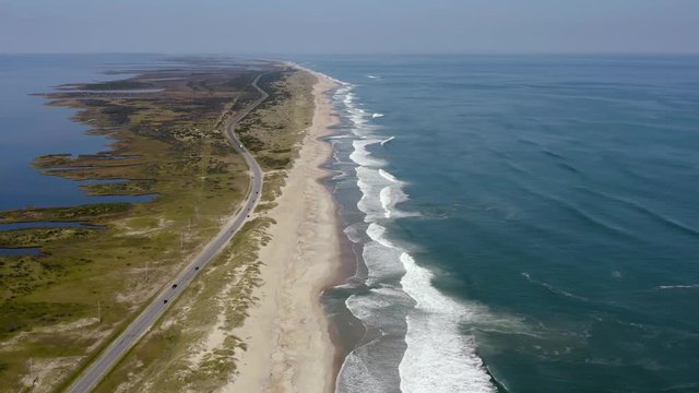 096 Aerial view of road between ocean side and sound side. 4k