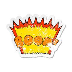 retro distressed sticker of a cartoon comic book explosion