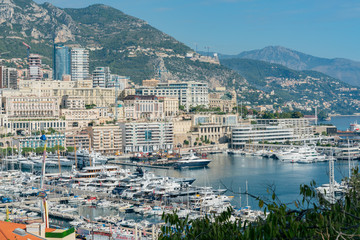 Fototapeta na wymiar Aerial view of the Monaco cityscape with many ships