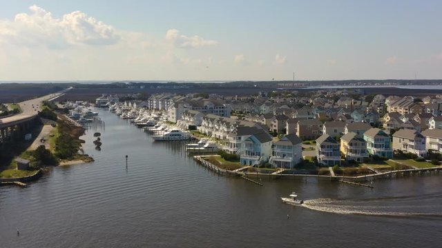 098 Aerial view of bridge, road, ocean and marina. 4k