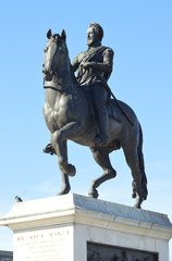 Fototapeta na wymiar King Henry IV equestrian statue on the Pont Neuf bridge, Paris, France