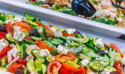 Assortment of fresh vegetable salads in restaurant buffet