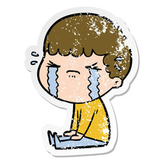 distressed sticker of a cartoon man crying