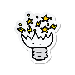 sticker of a cartoon exploding light bulb