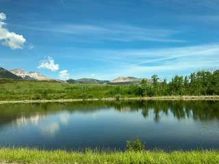 landscape with lake and blue sky