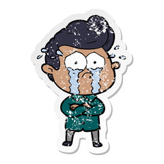 distressed sticker of a cartoon crying man with crossed arms
