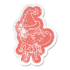 hand drawn cartoon distressed sticker of a happy bearded man wearing santa hat