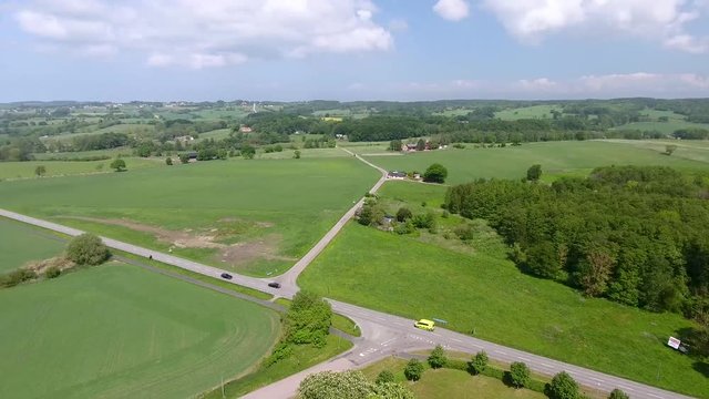 Aerial Footage of Ambulance driving on road.