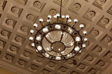 Chandelier on decoarted ceiling