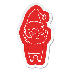 man with beard sticking out tongue wearing santa hat