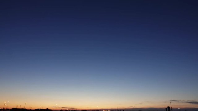 Twilight sky after sunset over landscape.
