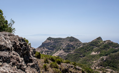 Naklejka premium far view to a island from Mountain with rocks