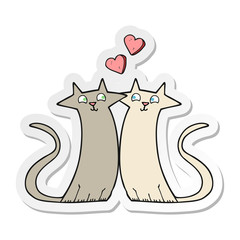 sticker of a cartoon cats in love