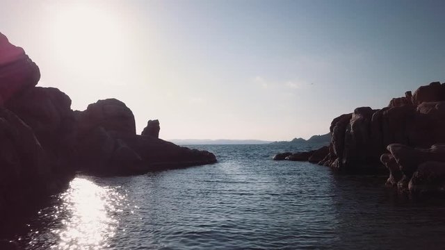 Aerial cliff to sea. Sea level. Wideshot in fullhd