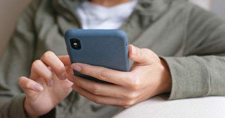 Close up of woman touch on smart phone