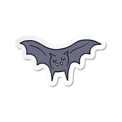 sticker of a cartoon vampire bat