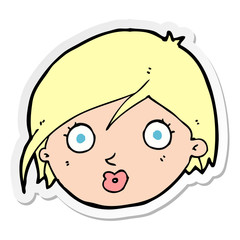 sticker of a cartoon surprised female face