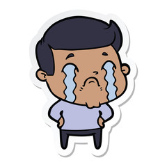 sticker of a cartoon man crying