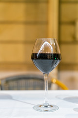 Close up of a glass of delicious red wine